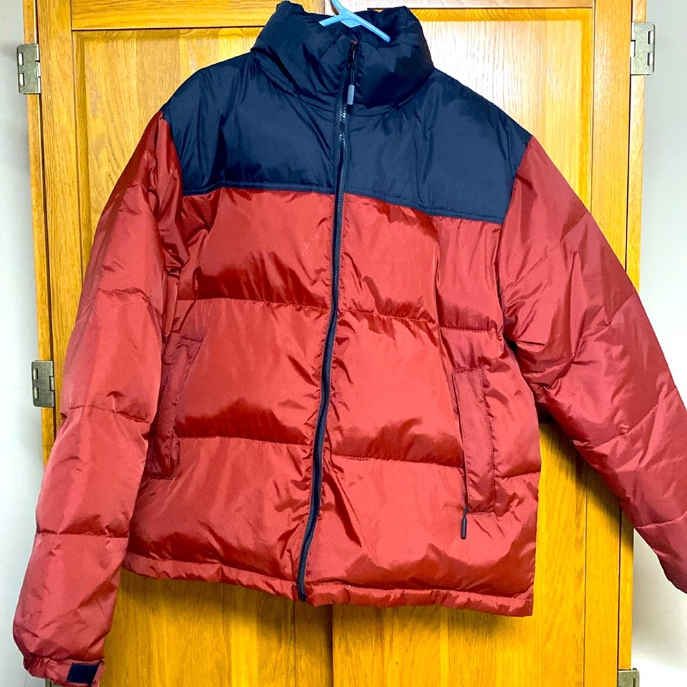 Winter jacket name brand Avalanche it’s red & black and the size is a large.